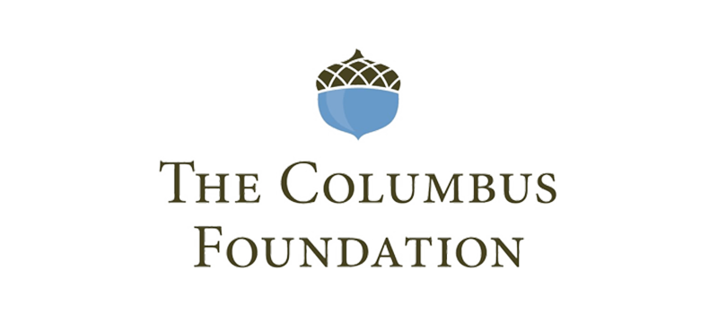 The Columbus Foundation logo featuring a blue acorn with a brown cap above the organizations name in capital letters on a white background.