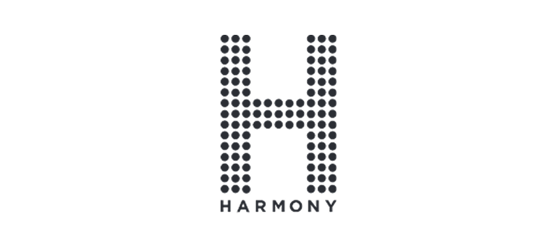 A large letter H formed by evenly spaced black dots, with the word HARMONY in uppercase letters written below it on a white background.