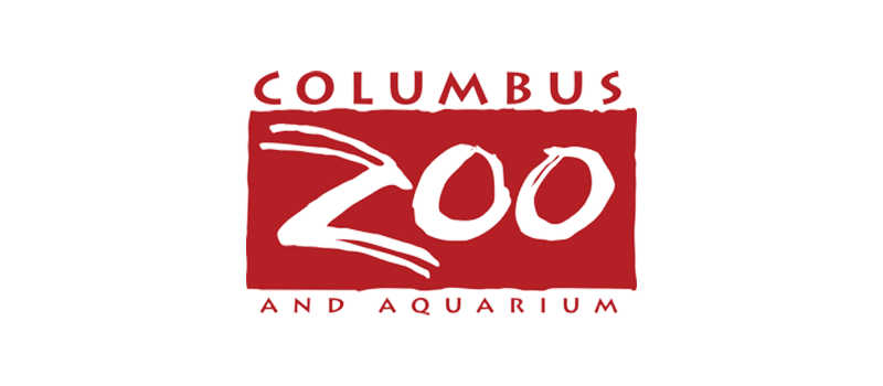Logo for the Columbus Zoo and Aquarium. The word Zoo is written in bold white letters with artistic brush strokes inside a red rectangle, with Columbus above and And Aquarium below in red text.